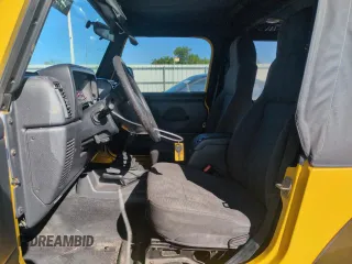 2004 Jeep Wrangler Sport z VIN 1J4FA49S64P751615, wystawiony jako Copart lot #55810895 z przebiegiem 128 165 mil mil oraz Szkoda całkowita • Salvage title. Historia ofert i sprzedaży dostępna na DreamBid. Obrazek 7.