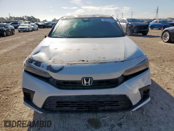 2023 Honda Civic Sport with VIN 2HGFE2F57PH511027, listed as a Copart auction lot 62703695 with 33,899 mi miles and Salvage title. Bid and sale history available at DreamBid. Image 5.