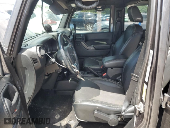 2016 Jeep Wrangler Unlimited Freedom с VIN 1C4BJWDG4GL153134, выставлен на аукционе Copart как лот 57954635 с пробегом 105 250 миль миль и Списание • Salvage title. История ставок и продаж доступна на DreamBid. Изображение 7.