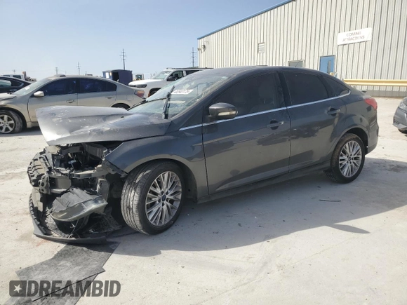 2016 Ford Focus Titanium with VIN 1FADP3J20GL274263, listed as a Copart auction lot 48340175 with 114,941 mi miles and Salvage title. Bid and sale history available at DreamBid. Image 1.