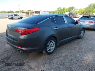 2011 Kia Optima LX with VIN KNAGM4A74B5085319, listed as a IAAI auction lot 42061665 with 224,517 mi miles and . Bid and sale history available at carsss.com. Image 4.
