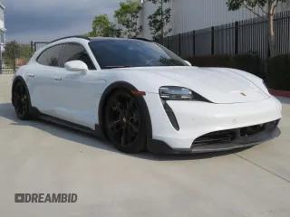 2022 Porsche Taycan 4 with VIN WP0BA2Y19NSA67581, listed as a Copart auction lot 44389585 with 6,775 mi miles and Salvage title. Bid and sale history available at DreamBid. Image 1.