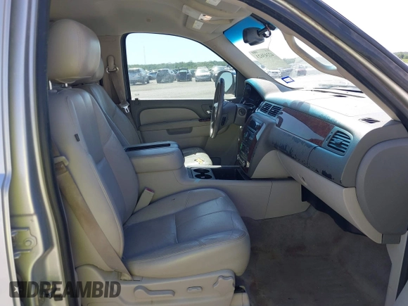2011 Chevrolet Tahoe LT with VIN 1GNSCBE05BR190310, listed as a IAAI auction lot 42243623 with 249,453 mi miles and . Bid and sale history available at DreamBid. Image 5.