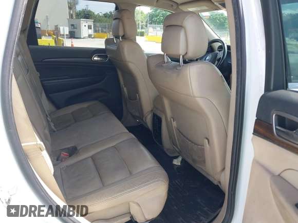 2014 Jeep Grand Cherokee Limited with VIN 1C4RJFBG5EC132159, listed as a IAAI auction lot 42604916 with 248,954 mi miles and . Bid and sale history available at DreamBid. Image 8.