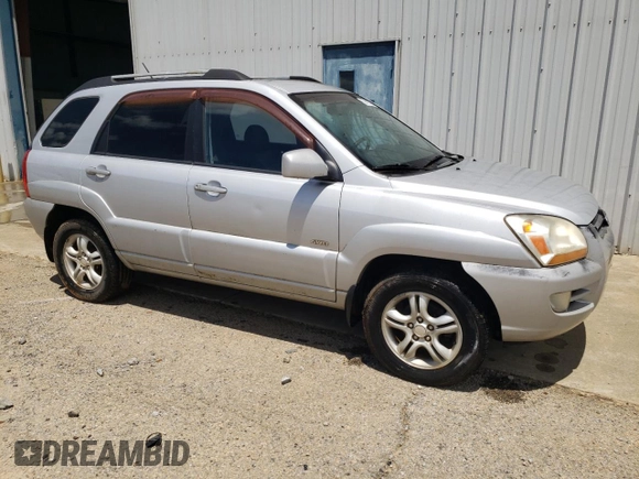 2005 Kia Sportage LX with VIN KNDJE723657067187, listed as a Copart auction lot 57403525 with 228,648 mi miles and Clean title. Bid and sale history available at DreamBid. Image 4.