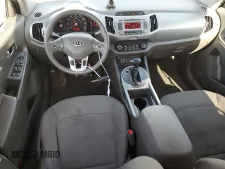 2012 Kia Sportage LX with VIN KNDPBCA21C7233424, listed as a Copart auction lot 61829465 with 129,526 mi miles and Salvage title. Bid and sale history available at DreamBid. Image 8.