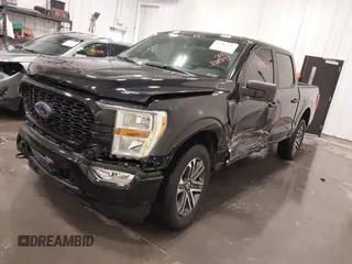 2021 Ford F-150 XL with VIN 1FTFW1E51MFD11166, listed as a IAAI auction lot 41883197 with 33,303 mi miles. Bid and sale history available at carsss.com. Image 2.
