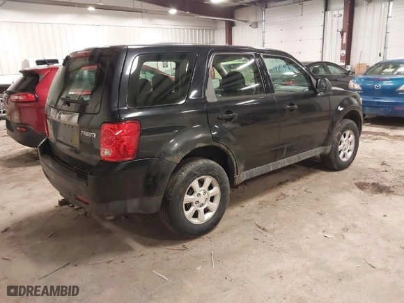 2009 Mazda Tribute Touring with VIN 4F2CZ02769KM00613, listed as a IAAI auction lot 41745880 with NaN miles. Bid and sale history available at carsss.com. Image 4.