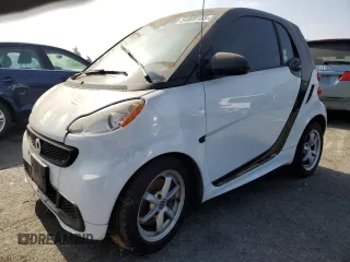 2014 Smart fortwo Pure with VIN WMEEJ3BA3EK780633, listed as a Copart auction lot 54009185 with 104,688 mi miles and Clean Title. Bid and sale history available at DreamBid. Image 1.