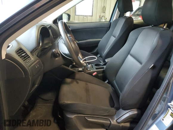 2016 Mazda CX-5 Sport z VIN JM3KE4BY0G0628372, wystawiony jako Copart lot #57534785 z przebiegiem 152 487 mil mil oraz Szkoda całkowita • Salvage title. Historia ofert i sprzedaży dostępna na DreamBid. Obrazek 7.