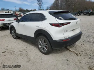 2022 Mazda CX-30 2.5 S Carbon Edition with VIN 3MVDMBCL9NM404733, listed as a Copart auction lot 48546265 with 39,436 mi miles and Salvage Title. Bid and sale history available at carsss.com. Image 2.