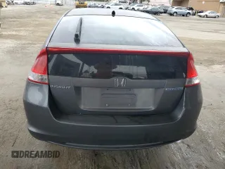 2011 Honda Insight EX with VIN JHMZE2H77BS006079, listed as a Copart auction lot 63873985 with 134,159 mi miles and Salvage title. Bid and sale history available at DreamBid. Image 6.