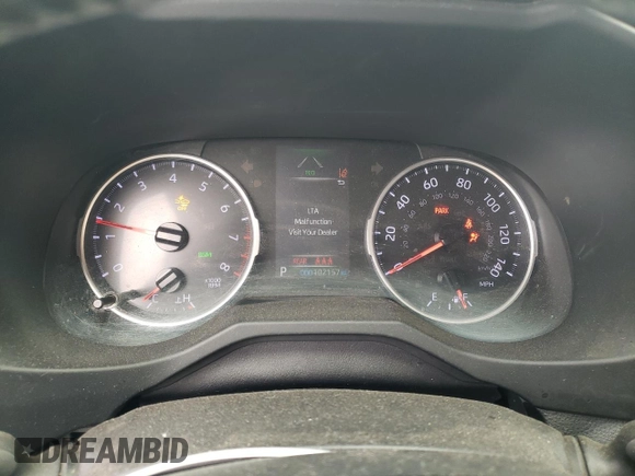 2019 Toyota RAV4 XLE with VIN JTMP1RFV9KD506960, listed as a Copart auction lot 50242025 with 102,157 mi miles and Salvage Title. Bid and sale history available at DreamBid. Image 9.