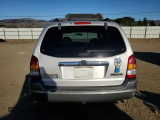 2001 Mazda Tribute LX with VIN 4F2CU08111KM20113, listed as a Copart auction lot 87681195 with 144,400 mi miles and Salvage Title. Bid and sale history available at DreamBid. Image 6.