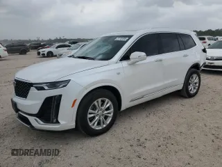 2024 Cadillac XT6 FWD Luxury with VIN 1GYKPAR47RZ720446, listed as a Copart auction lot 51762695 with 10,728 mi miles and Salvage Title. Bid and sale history available at carsss.com. Image 1.