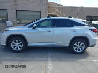 2016 Lexus RX 350 with VIN 2T2BZMCA6GC038564, listed as a IAAI auction lot 42203817 with 140,147 mi miles and . Bid and sale history available at DreamBid. Image 14.
