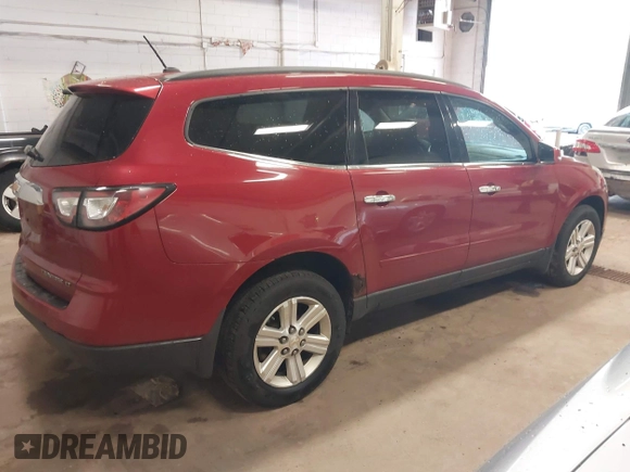2013 Chevrolet Traverse LT with VIN 1GNKVJKDXDJ185830, listed as a IAAI auction lot 42142542 with 218,069 mi miles and . Bid and sale history available at DreamBid. Image 4.