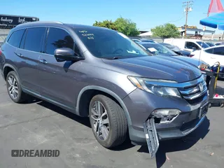 2016 Honda Pilot Touring with VIN 5FNYF5H92GB050380, listed as a IAAI auction lot 42246796 with 80,223 mi miles and . Bid and sale history available at DreamBid. Image 1.