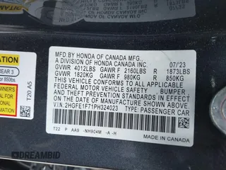 2023 Honda Civic Sedan EX with VIN 2HGFE1F71PH324023, listed as a IAAI auction lot 39256308 with 6,451 mi miles. Bid and sale history available at carsss.com. Image 9.