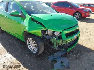 2014 Chevrolet Sonic LT with VIN 1G1JC5SH3E4219619, listed as a IAAI auction lot 41208791 with 122,161 mi miles. Bid and sale history available at carsss.com. Image 6.