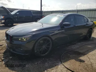 2016 BMW 7 Series 740i с VIN WBA7E2C56GG738788, выставлен на аукционе Copart как лот 60654015 с пробегом 96 059 миль миль и Чистый • Clean title. История ставок и продаж доступна на DreamBid. Изображение 1.