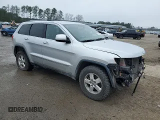 2012 Jeep Grand Cherokee Laredo with VIN 1C4RJFAG2CC294202, listed as a Copart auction lot 44918715 with 104,605 mi miles and Salvage Title. Bid and sale history available at carsss.com. Image 4.