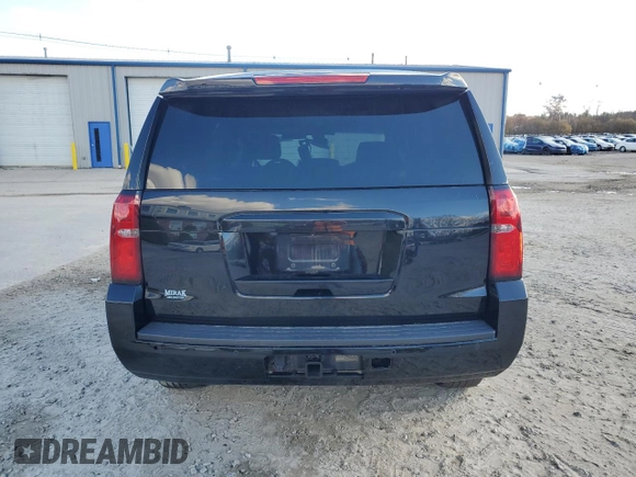 2016 Chevrolet Tahoe Commercial with VIN 1GNSKFKC9GR372057, listed as a Copart auction lot 80070854 with 127,475 mi miles and Salvage title. Bid and sale history available at DreamBid. Image 6.