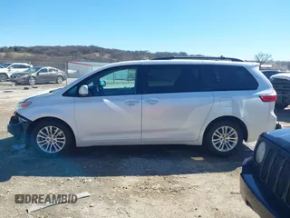 2015 Toyota Sienna XLE with VIN 5TDYK3DC7FS661582, listed as a IAAI auction lot 41688972 with 145,953 mi miles. Bid and sale history available at carsss.com. Image 15.