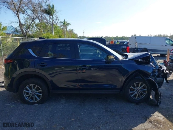 2022 Mazda CX-5 2.5 S Carbon Edition with VIN JM3KFBCM7N0619047, listed as a IAAI auction lot 41247709 with NaN miles. Bid and sale history available at carsss.com. Image 14.