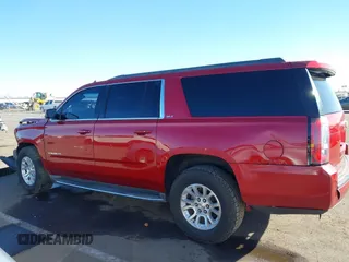 2015 GMC Yukon XL SLT with VIN 1GKS2HKC0FR585406, listed as a IAAI auction lot 41412441 with 210,321 mi miles. Bid and sale history available at carsss.com. Image 14.