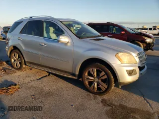 2009 Mercedes-Benz M 3.5L with VIN 4JGBB56EX9A521264, listed as a Copart auction lot 87000234 with 239,700 mi miles and Clean Title. Bid and sale history available at carsss.com. Image 4.