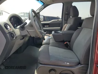 2005 Ford F-150 XLT with VIN 1FTPW125X5KF09293, listed as a Copart auction lot 60921515 with 154,521 mi miles and Salvage title. Bid and sale history available at DreamBid. Image 7.