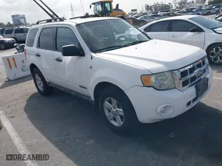 2008 Ford Escape Hybrid with VIN 1FMCU59H08KB03793, listed as a IAAI auction lot 41906611 with 218,660 mi miles. Bid and sale history available at carsss.com. Image 1.