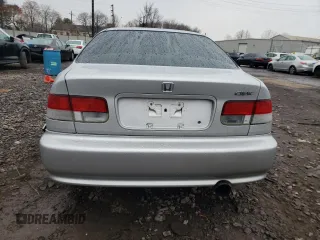 1999 Honda Civic EX with VIN 1HGEJ8140XL066559, listed as a Copart auction lot 82600804 with 323,648 mi miles and Salvage Title. Bid and sale history available at carsss.com. Image 6.