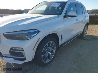 2019 BMW X5 xDrive40i with VIN 5UXCR6C50KLL09819, listed as a IAAI auction lot 41807856 with 92,736 mi miles. Bid and sale history available at carsss.com. Image 6.