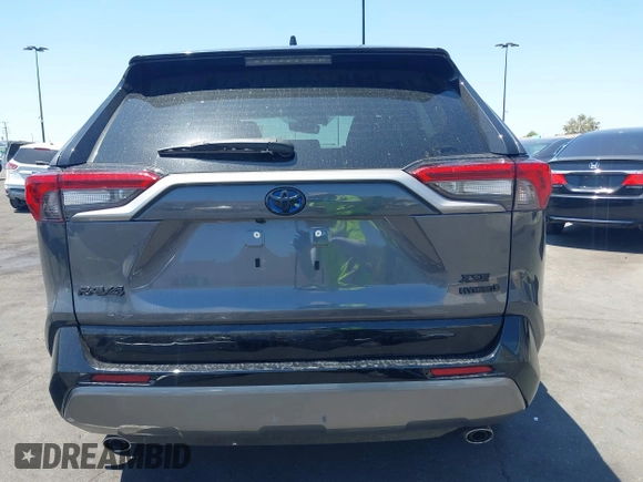 2021 Toyota RAV4 Hybrid XSE with VIN 2T3E6RFVXMW016803, listed as a IAAI auction lot 42135617 with 40,898 mi miles and . Bid and sale history available at DreamBid. Image 17.