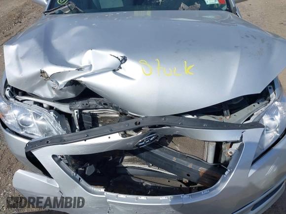 2008 Toyota Camry LE z VIN 4T1BE46K98U764634, wystawiony jako IAAI lot #39122102 z przebiegiem 143 861 mil mil oraz . Historia ofert i sprzedaży dostępna na DreamBid. Obrazek 10.
