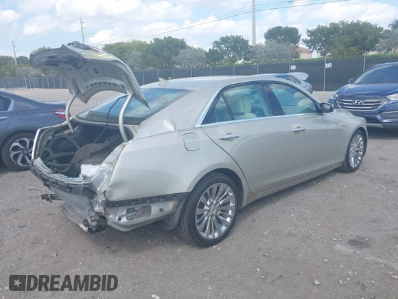 2014 Cadillac CTS Luxury RWD with VIN 1G6AR5SX1E0158438, listed as a IAAI auction lot 41801082 with 28,888 mi miles. Bid and sale history available at carsss.com. Image 4.