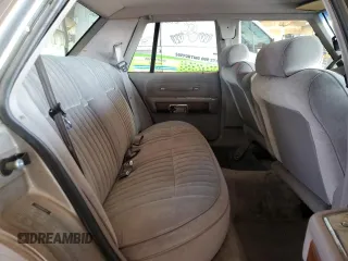 1990 Ford Crown Victoria z VIN 2FACP73F9LX166174, wystawiony jako Copart lot #76043234 z przebiegiem 52 545 mil mil oraz Szkoda całkowita • Salvage title. Historia ofert i sprzedaży dostępna na DreamBid. Obrazek 10.