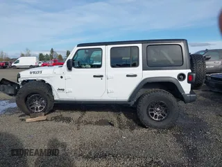 2023 Jeep Wrangler Sport with VIN 1C4HJXDG4PW567027, listed as a IAAI auction lot 41633197 with 14,782 mi miles and . Bid and sale history available at DreamBid. Image 15.