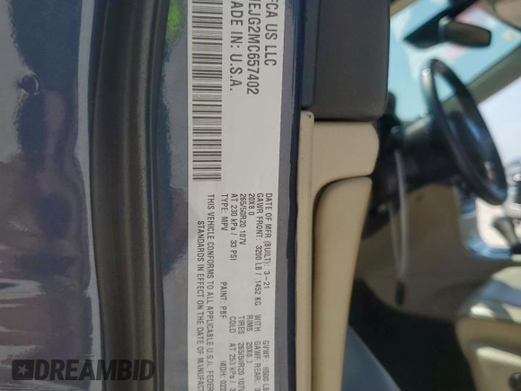 2021 Jeep Grand Cherokee Summit with VIN 1C4RJEJG2MC657402, listed as a Copart auction lot 59098465 with 61,442 mi miles and Salvage title. Bid and sale history available at DreamBid. Image 14.