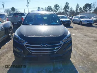 2017 Hyundai Tucson SE Plus with VIN KM8J33A49HU381233, listed as a IAAI auction lot 41393645 with 83,708 mi miles. Bid and sale history available at carsss.com. Image 12.