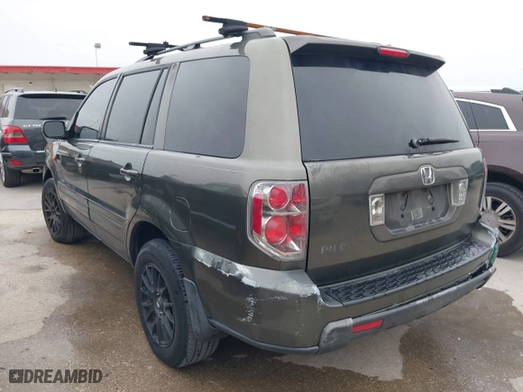 2006 Honda Pilot EX-L with VIN 5FNYF28556B010384, listed as a IAAI auction lot 41380835 with 233,359 mi miles. Bid and sale history available at carsss.com. Image 3.
