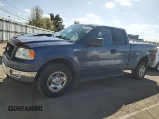 2005 Ford F-150 XLT with VIN 1FTPX14595NA25303, listed as a Copart auction lot 50960805 with 223,385 mi miles and Salvage Title. Bid and sale history available at carsss.com. Image 1.