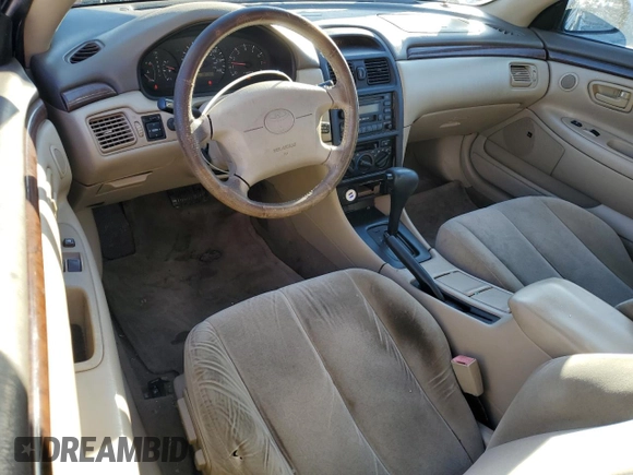 1999 Toyota Solara SE with VIN 2T1CF22P6XC256483, listed as a Copart auction lot 46165865 with 381,309 mi miles and Clean Title. Bid and sale history available at DreamBid. Image 8.