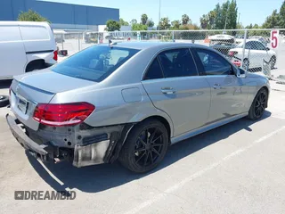 2014 Mercedes-Benz E 350 Sport with VIN WDDHF5KB5EB000039, listed as a IAAI auction lot 42345657 with 95,857 mi miles and . Bid and sale history available at DreamBid. Image 4.