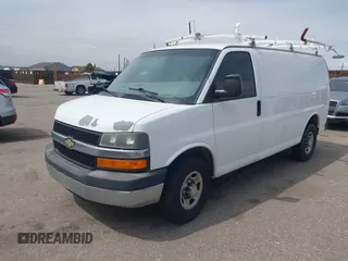 2012 Chevrolet Express Cargo Van with VIN 1GCWGFCA7C1121989, listed as a IAAI auction lot 42118853 with 214,478 mi miles. Bid and sale history available at carsss.com. Image 17.
