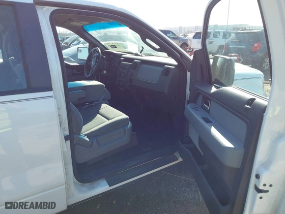 2013 Ford F-150 XL with VIN 1FTEW1CM6DKG34089, listed as a IAAI auction lot 41668428 with 173,709 mi miles. Bid and sale history available at carsss.com. Image 5.