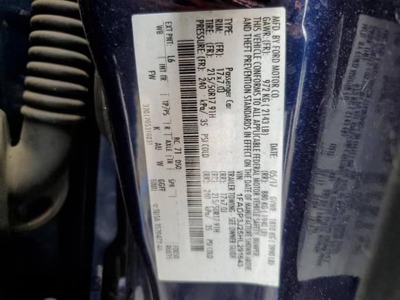 2017 Ford Focus Titanium with VIN 1FADP3J25HL291643, listed as a Copart auction lot 57657615 with 174,582 mi miles and Salvage title. Bid and sale history available at DreamBid. Image 12.
