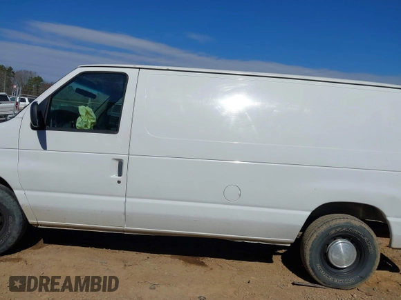 1999 Ford Econoline Cargo with VIN 1FTRE14W0XHB64440, listed as a IAAI auction lot 41645551 with 239,114 mi miles. Bid and sale history available at carsss.com. Image 14.